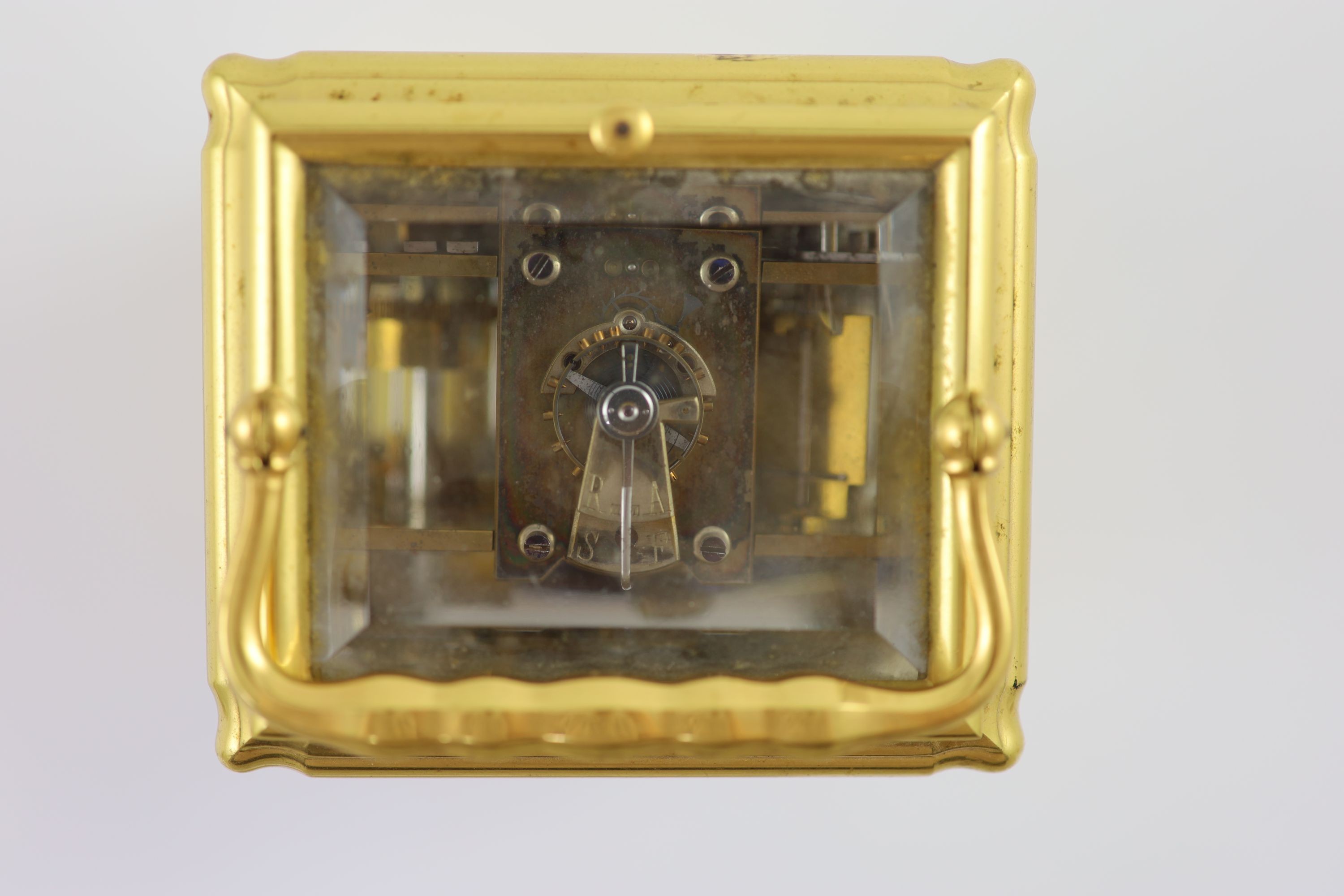 An early 20th century French quarter repeating Grand Sonnerie carriage alarum clock H 15cm. W 9.5cm. D 8.5cm.